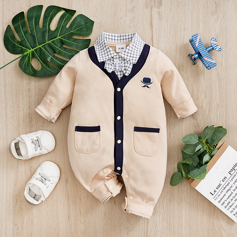 Elegant Gentleman Style Baby Outfit - Beige Cotton Jumpsuit with Checkered Collar featuring snap buttons and pockets on wooden background