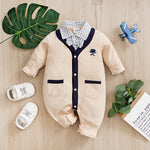 Elegant Gentleman Style Baby Outfit - Beige Cotton Jumpsuit with Checkered Collar featuring snap buttons and pockets on wooden background