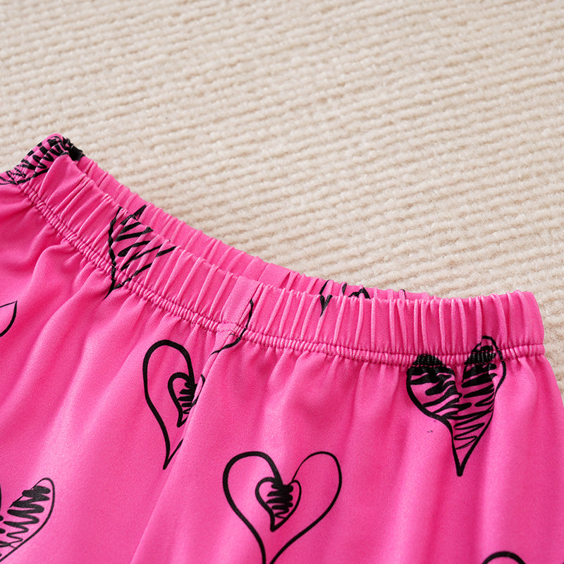 Adorable Little Lovebug Baby Girl Clothing Set - Soft Cotton Outfit for Infants with elastic waistband and black heart print on pink fabric