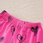 Adorable Little Lovebug Baby Girl Clothing Set - Soft Cotton Outfit for Infants with elastic waistband and black heart print on pink fabric