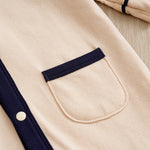 Elegant Gentleman Style Baby Outfit - Beige Cotton Jumpsuit with Checkered Collar close-up of navy trimmed pocket and snap button detail