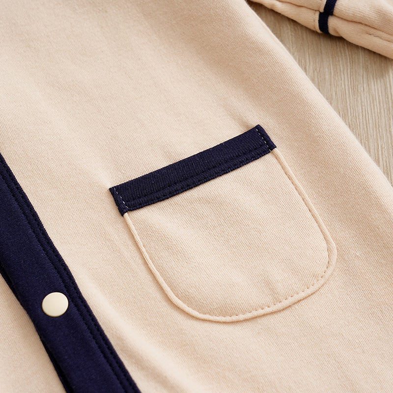 Elegant Gentleman Style Baby Outfit - Beige Cotton Jumpsuit with Checkered Collar close-up of navy trimmed pocket and snap button detail