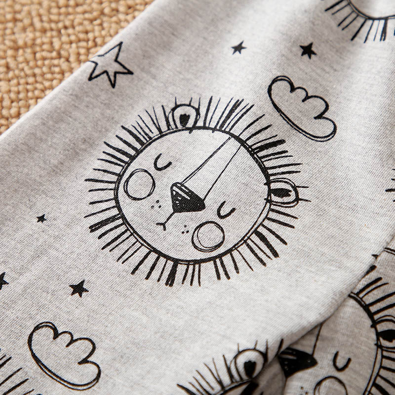 Gray fabric with black sun and cloud pattern