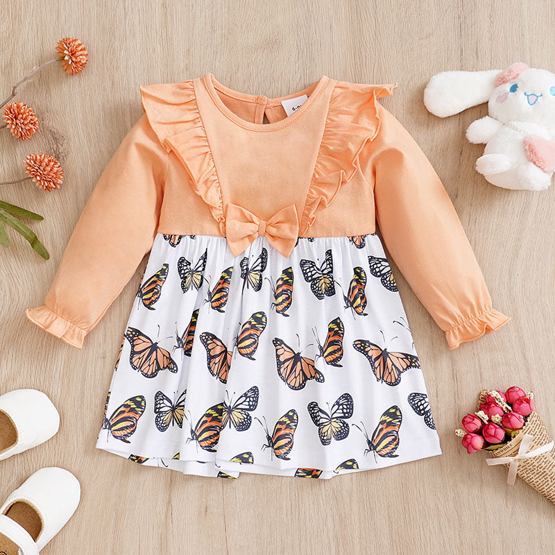 Baby Butterfly Dress Long Sleeve | Hushies Boutique with peach ruffles and butterfly print skirt on soft fabric