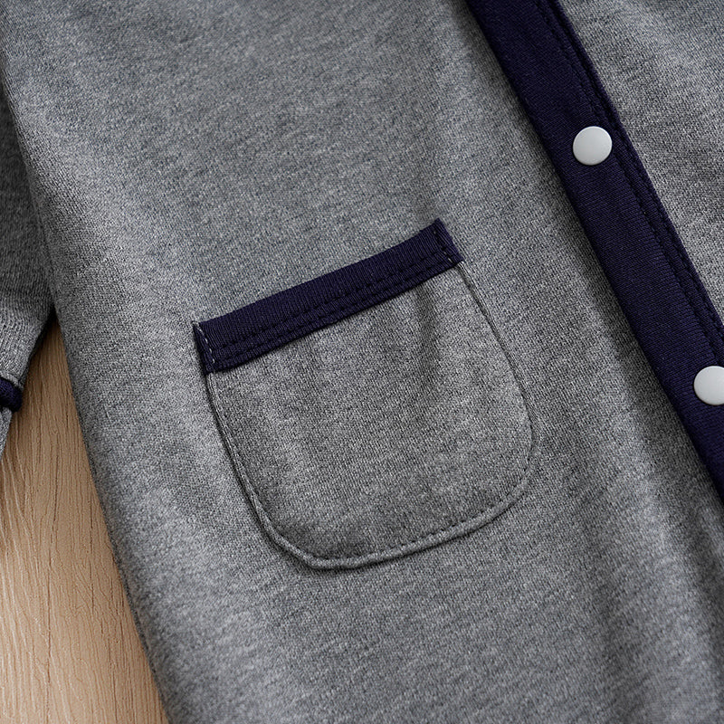 Baby Boy Cotton Gentleman Outfit - Soft, Stylish, Eco-Friendly Jumpsuit with Classic Design showing pocket and snap button details on gray fabric