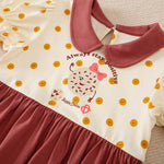 Soft cotton toddler dress with reddish-brown collar, polka dots, and a cookie graphic.