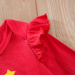 Baby Girls First Christmas Outfit – Ruffle Bodysuit Set featuring vibrant red fabric with delicate ruffled shoulder detail