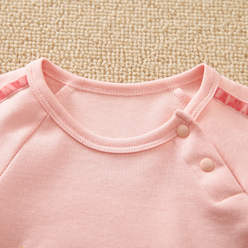 Unicorn Baby Jumpsuit Pink Romper | Hushies Soft Bow close-up of neckline and snap button closure on soft pink fabric