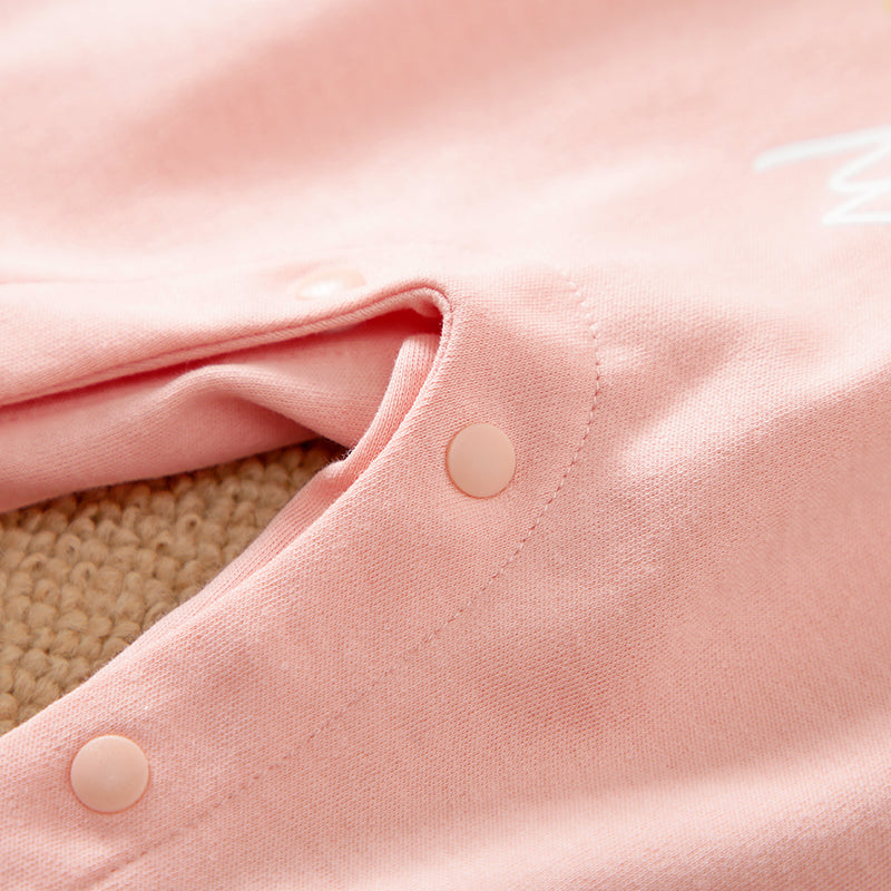 Unicorn Baby Jumpsuit Pink Romper | Hushies Soft Bow close-up of snap buttons on soft pink infant baby romper fabric