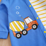 Builder Themed Baby Outfit for Boys - Tiny Builder Jumpsuit close-up of colorful cement truck print and yellow snap buttons on fabric