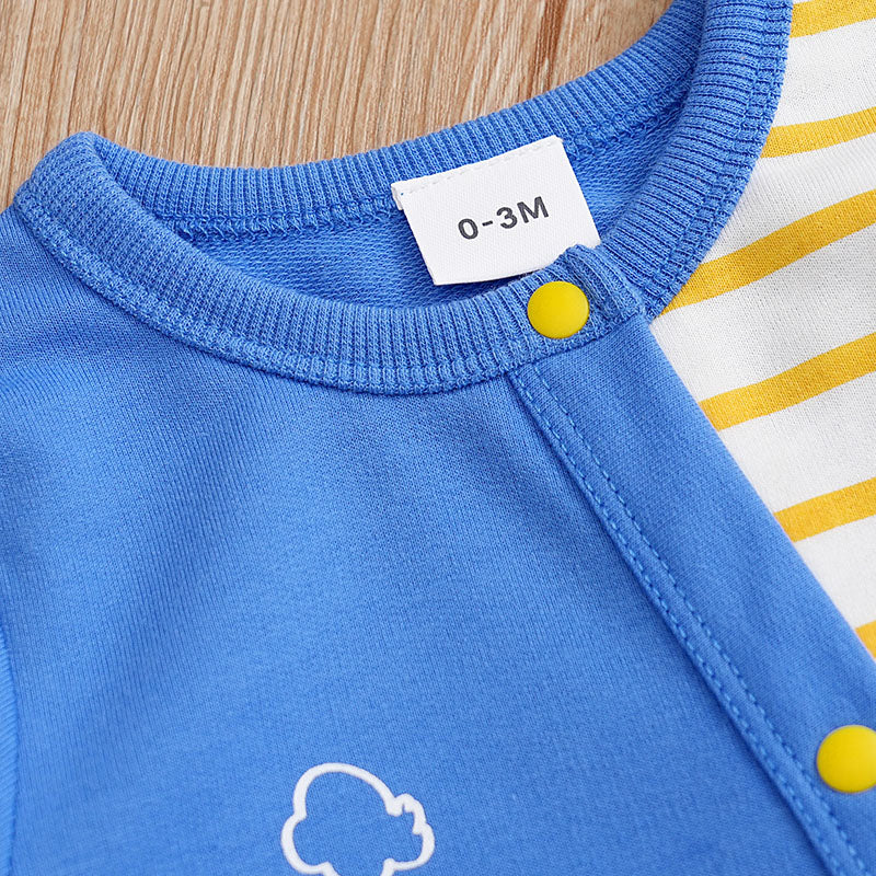 Builder Themed Baby Outfit for Boys - Tiny Builder Jumpsuit close-up of blue fabric neckline and yellow snap button detail