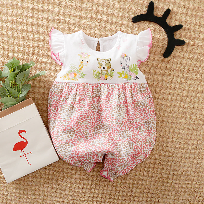 Baby romper with animal prints on a beige background