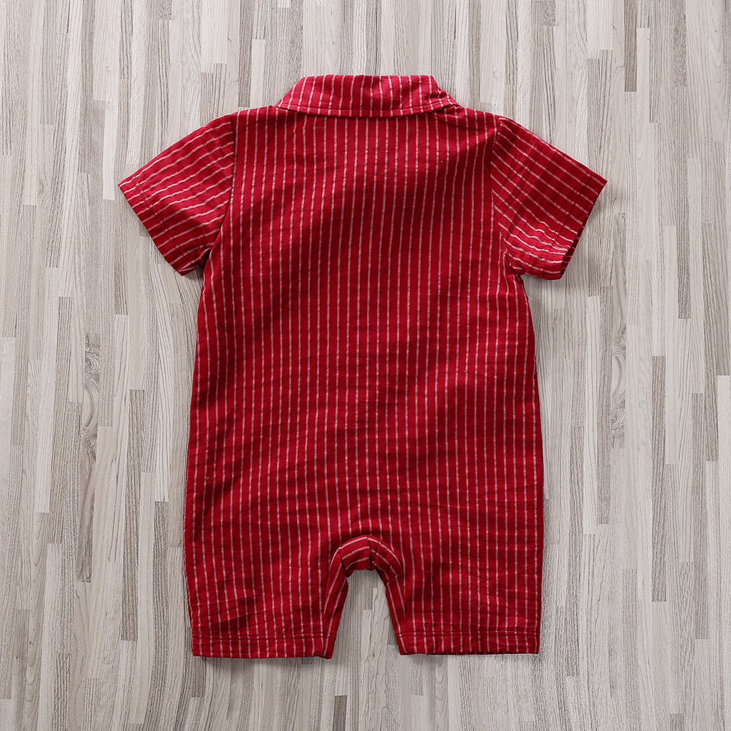 The Adorable 1-Piece Striped Infant Clothing Jumpsuit With Bow Tie & Button-Up Front is shown from the back, featuring red short sleeves, a collar, and vertical white pinstripes, laid flat on a light wood floor.
