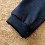 Baby Jumpsuit Nighty Night Hushies - Unisex Soft Cotton close-up of navy cuff with snap button on infant sleepwear