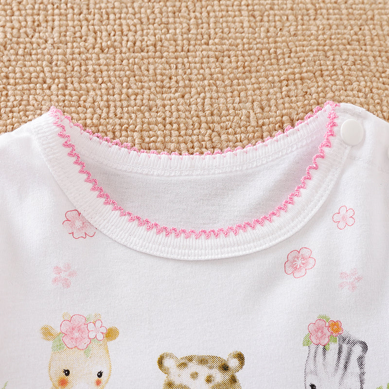 Soft white baby garment with pink zigzag trim and cute animal prints.