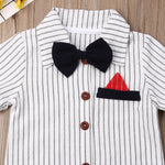 White striped baby shirt with black bow tie and red pocket square.