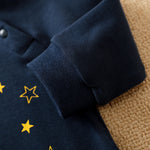 Baby Jumpsuit Nighty Night Hushies - Unisex Soft Cotton close-up of cuff and yellow star print on navy infant sleepwear