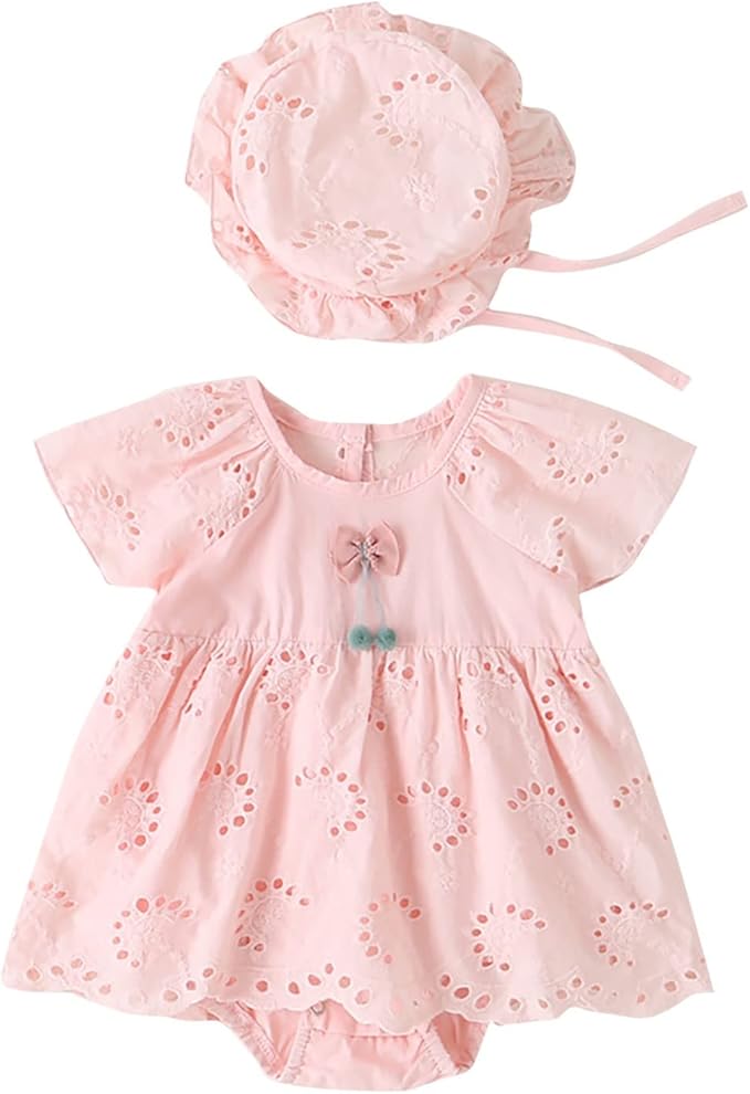 Pink eyelet cotton baby romper dress with short sleeves and matching hat.