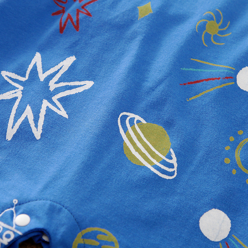 Cozy Baby Blue Romper with Star Print by Hushies - Soft cotton fabric with space-themed planets and stars, snap button detail close-up