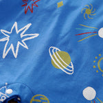 Cozy Baby Blue Romper with Star Print by Hushies - Soft cotton fabric with space-themed planets and stars, snap button detail close-up