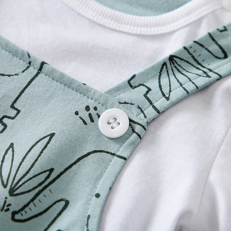 Close-up of snap button and printed fabric detail on Unisex Baby Romper with Adorable Elephant Print - Soft Cotton, Easy Snap Closures, Perfect for Play
