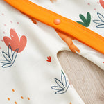 Adorable Giraffe Pattern Baby Outfit for Girls - Little Explorer Jumpsuit with orange trim and snap buttons on soft infant baby jumpsuit