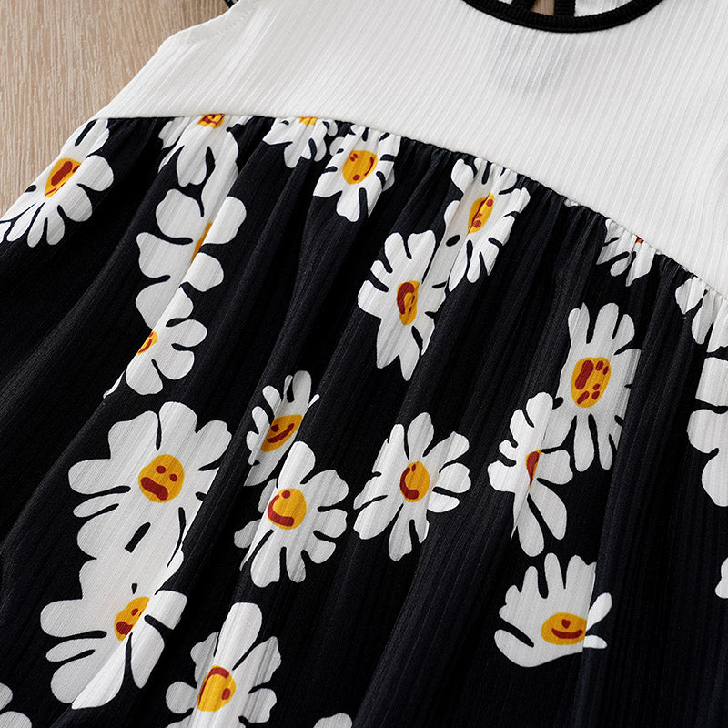 Sunshine Daisy Baby Romper Girls - Floral Summer Romper with black and white fabric detailed with playful daisy prints for toddler clothing