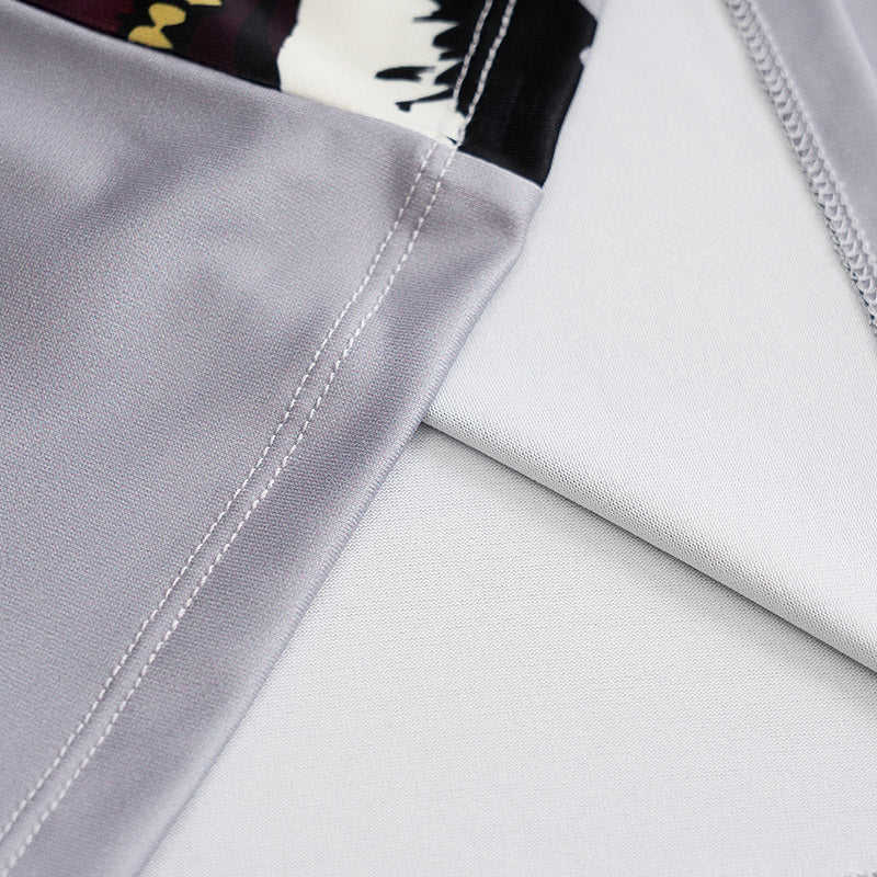 Close-up of gray fabric with a focus on stitching detail