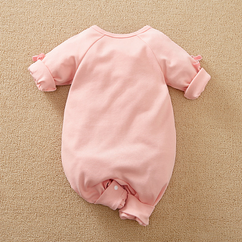 Unicorn Baby Jumpsuit Pink Romper | Hushies Soft Bow back view of soft pink infant romper with rolled sleeves and snap buttons