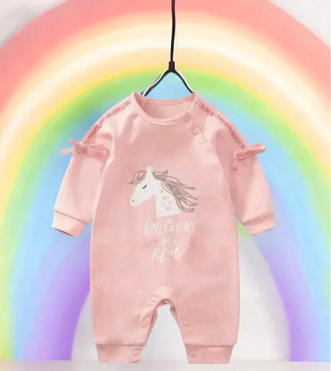 Adorable baby girl's pink romper featuring a whimsical unicorn design, perfect for little ones who love magic and fun.