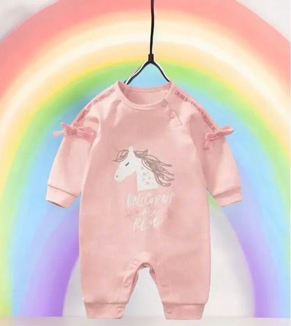 Adorable baby girl's pink romper featuring a whimsical unicorn design, perfect for little ones who love magic and fun.