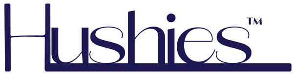 Logo of "Hushies™" in elegant, modern typography, showcasing a deep navy blue color on a white background.