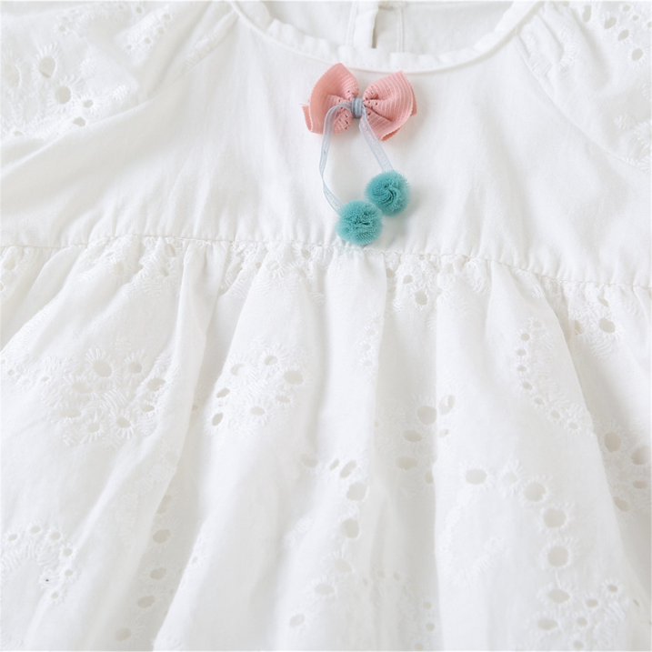 Baby Girl Cotton Romper Dress With Matching Hat – Soft, Breathable, Floral Design, Easy Diaper Access close-up of embroidered fabric and bow detail