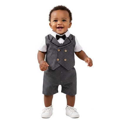 Stylish 2-Piece Baby Boy Gentleman Outfit With Bow Tie & Vest worn by a joyful baby standing, emphasizing the elegant pinstripe look, a perfect gentleman outfit for baby.