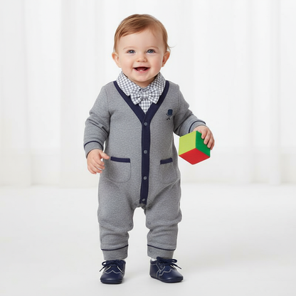 Baby Boy Cotton Gentleman Outfit - A joyful baby in a stylish gray cotton gentleman outfit, standing and holding a colorful block.
