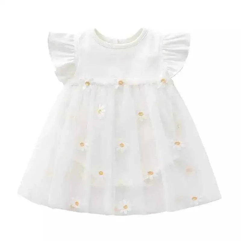 Charming white dress for baby girls featuring delightful daisies, ideal for playdates and family gatherings.