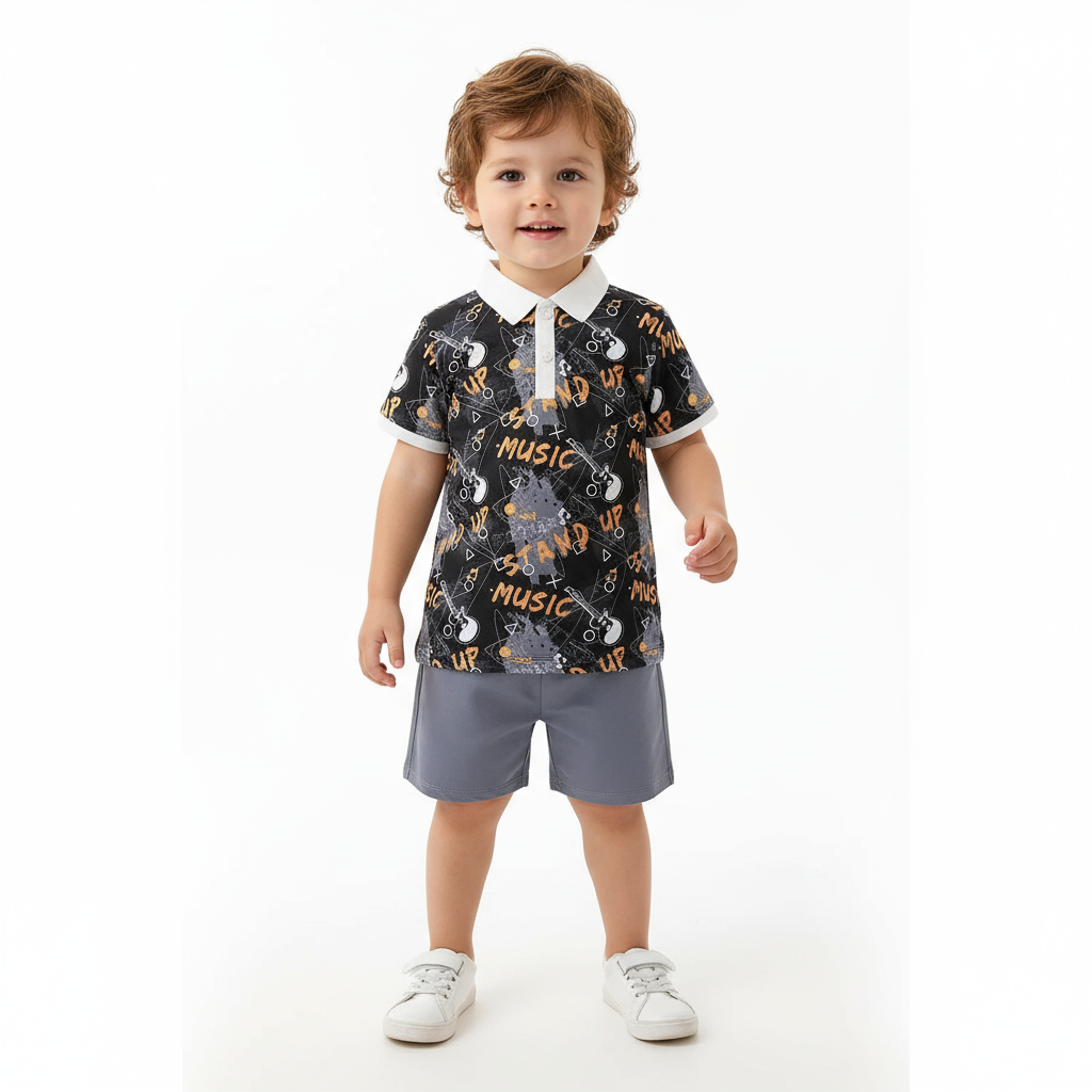 Happy toddler wearing a musical themed polo shirt and shorts from the musical themed toddler boys clothing set, ideal for fun activities.