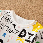 Baby Dinosaur Jumpsuit With 3D Spikes, Soft Cotton, Easy Snap Closure for Infants & Toddlers featuring colorful dinosaur print neckline close-up