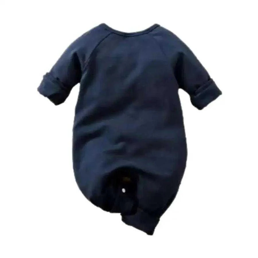 Adorable unisex baby jumpsuit adorned with a moon and stars, ideal for sweet dreams and nighttime snuggles.